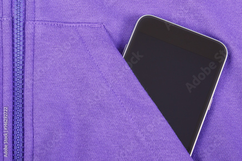 Mobile phone with blank screen in pocket sweatshirt, smartphone