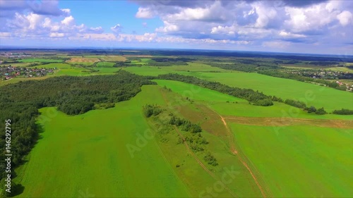 Drone flight over thegreen fields photo