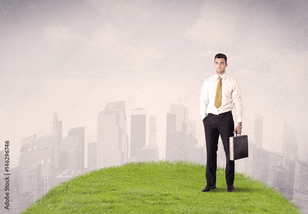 man standing in front of city landscape man standing in front of city landscape
