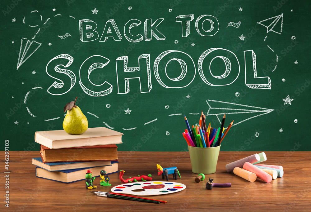Back to school blackboard and student desk