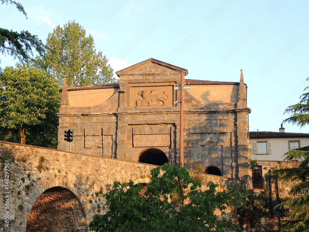 Bergamo - Old city (Città Alta). One of the beautiful city in Italy. Lombardia. Landscape on the old gate named Porta Sant Agostino during the sunrise