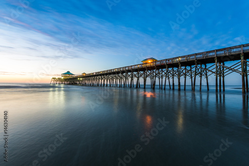 Fototapeta Naklejka Na Ścianę i Meble -  Folly Beach Pier at Sunrise in Charleston, South Carolina