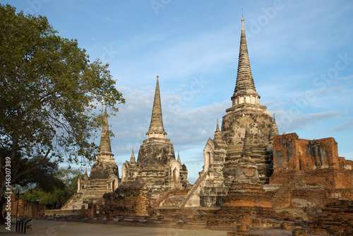 Three ancient stupas of the Buddhist temple of Wat Phra Si Sanphet on a cloudy morning. Ayutthaya  Thailand