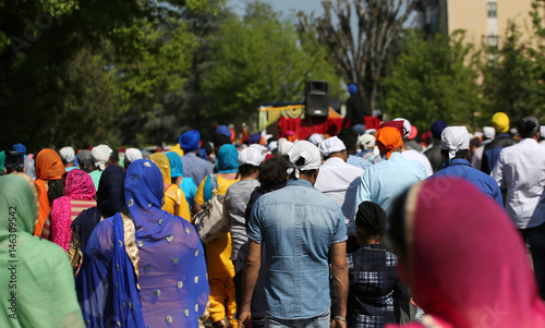 Procession of Sikh religion people with many families  during th