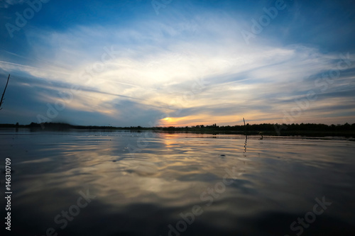Beautiful sunset on the lake shore