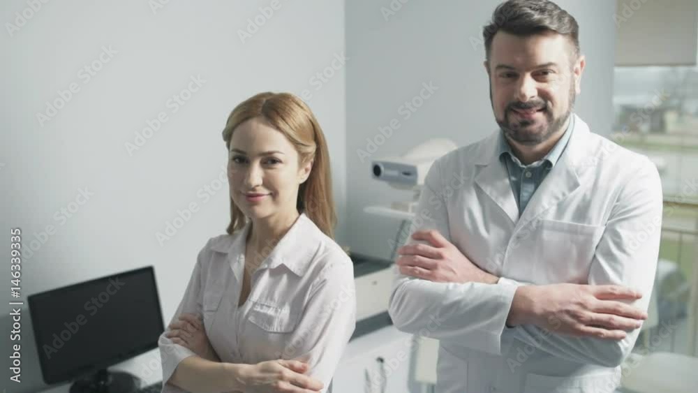 Portrait of cheerful doctors posing together Portrait of cheerful doctors posing together