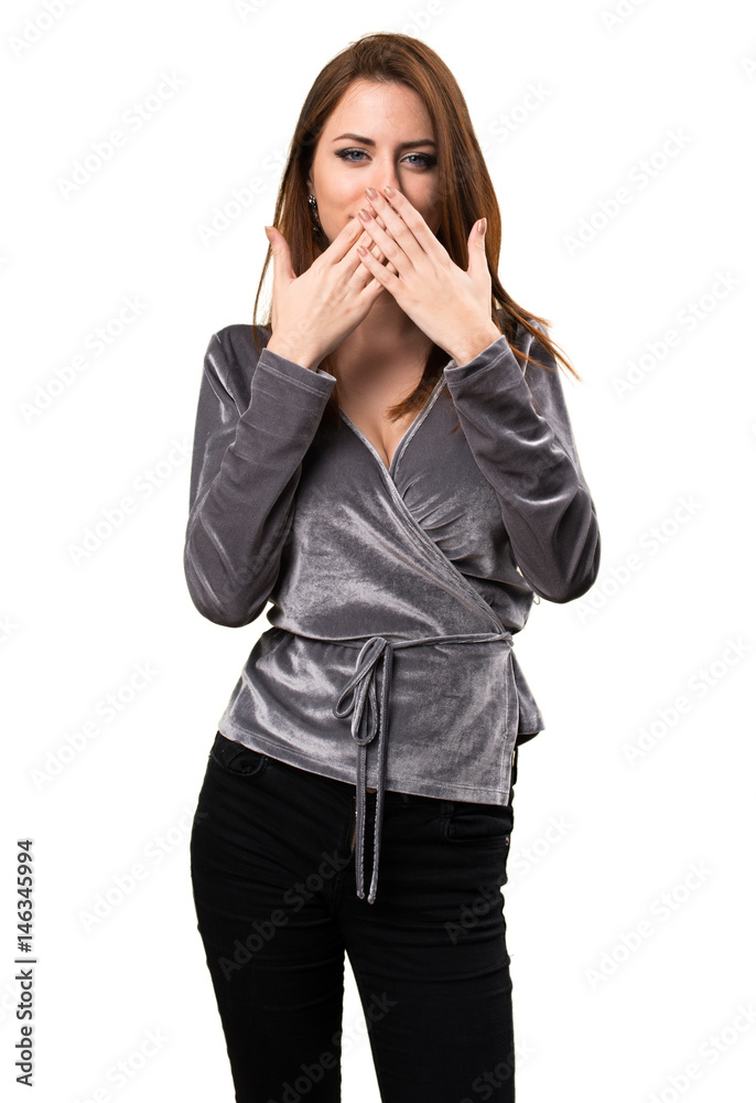 Beautiful young girl covering her mouth Beautiful young girl covering her mouth