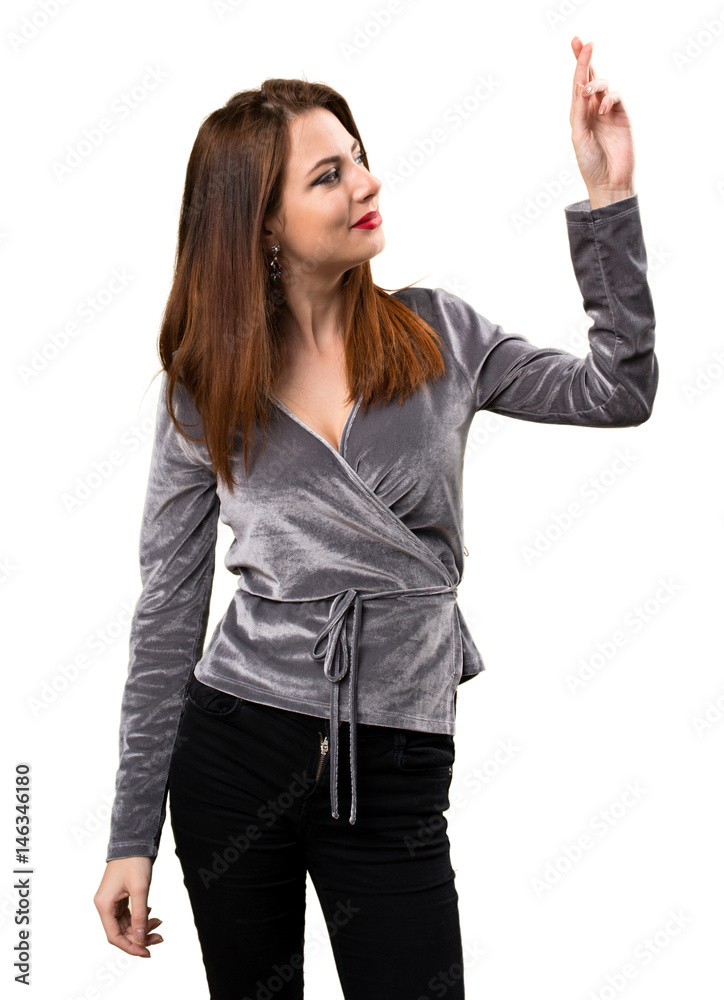Beautiful young girl with her fingers crossing Beautiful young girl with her fingers crossing