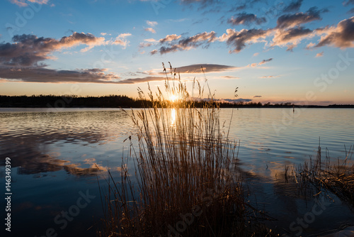 dramatic sunrise over the calm river