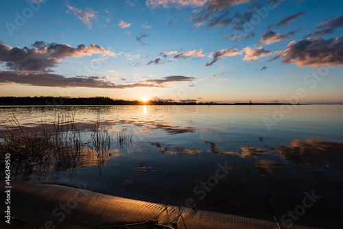 dramatic sunrise over the calm river