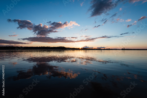 dramatic sunrise over the calm river