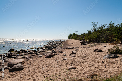 View of a rocky coast beach in the morning.