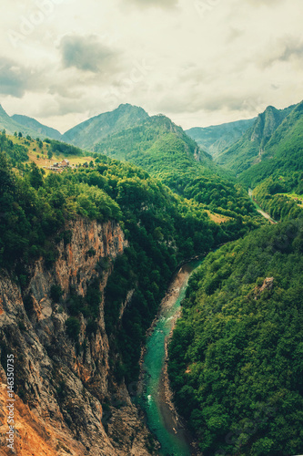 The Tara River and Canyon, and its countryside, in northern Montenegro. Montenegro,Tara River next to Djurdjevi bridge photo