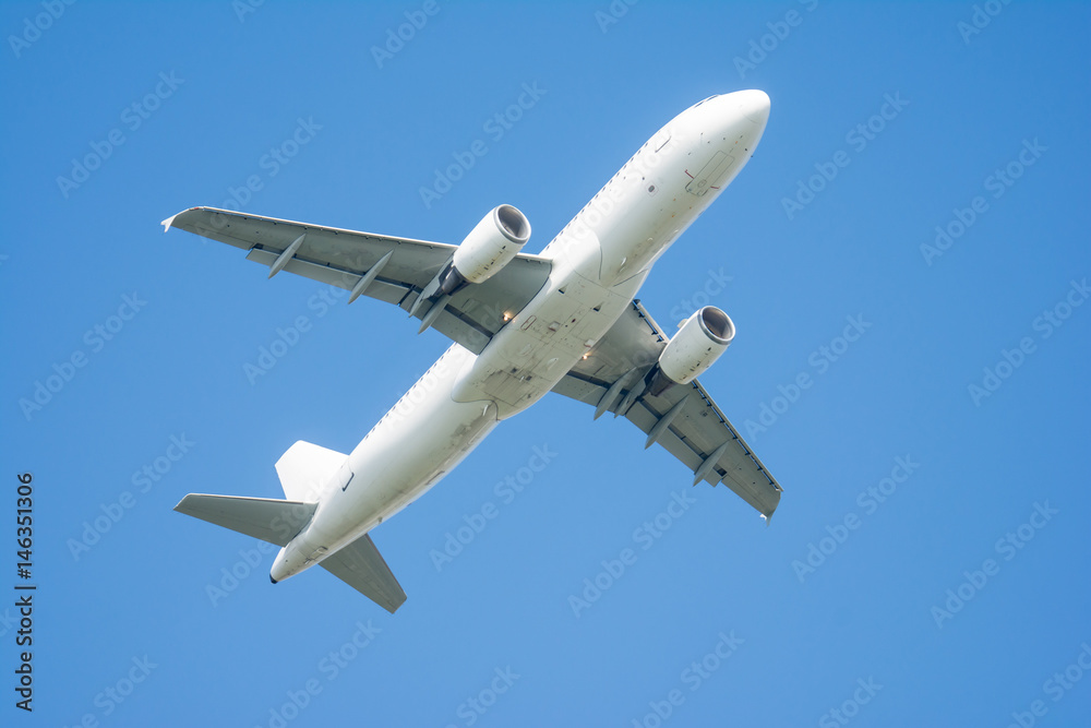 Airliner flying on blue sky Airliner flying on blue sky