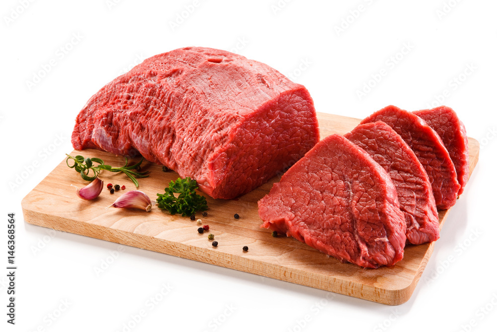 Fresh raw beef steaks on white background