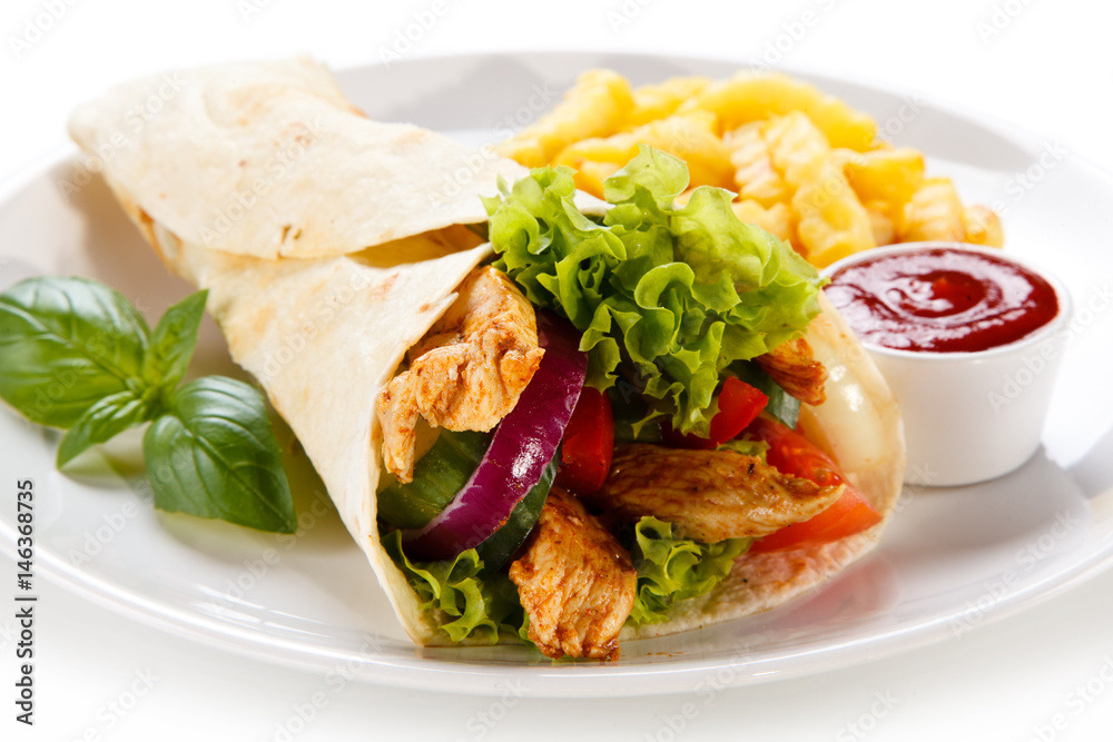 Tortilla wrap with french fries on white background Tortilla wrap with french fries on white background
