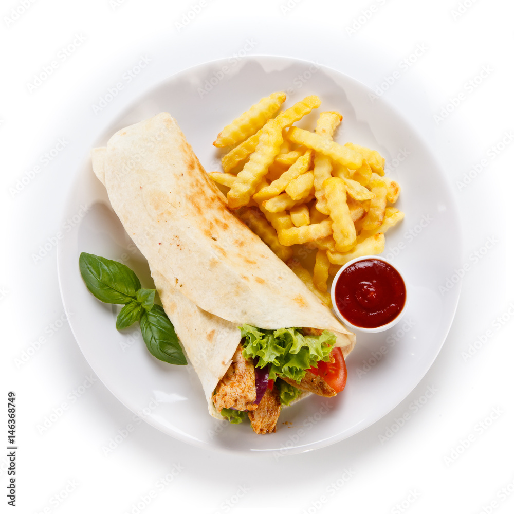 Tortilla wrap with french fries on white background