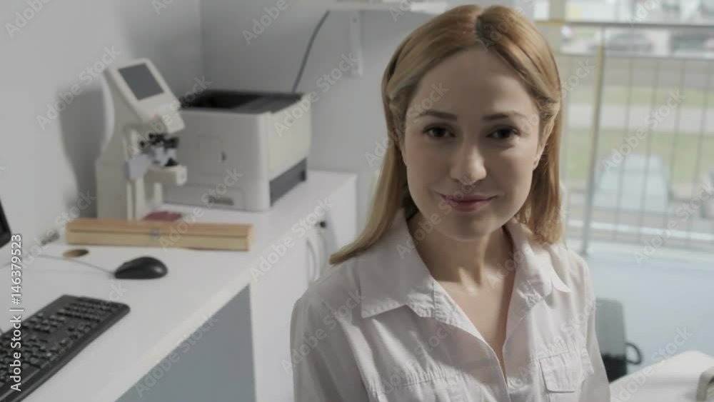 Portrait of young female doctor talking in office Portrait of young female doctor talking in office