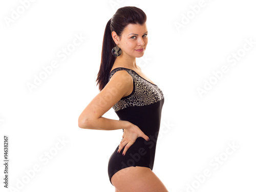 Young woman in swimming suit with earrings