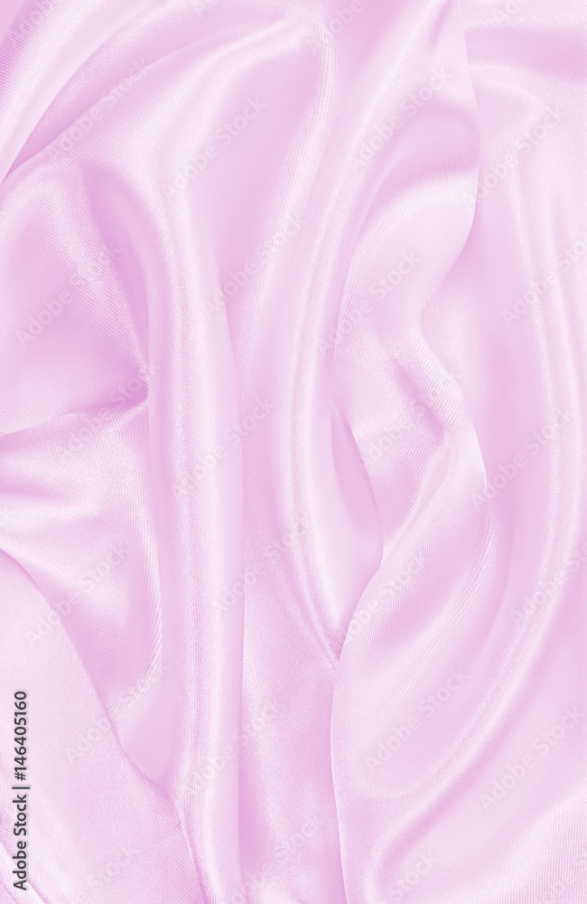 Obraz premium Smooth elegant pink silk or satin texture as wedding background. Luxurious background design