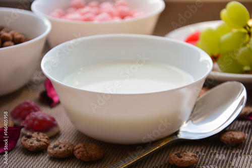 A plate of milk for breakfast with cereal