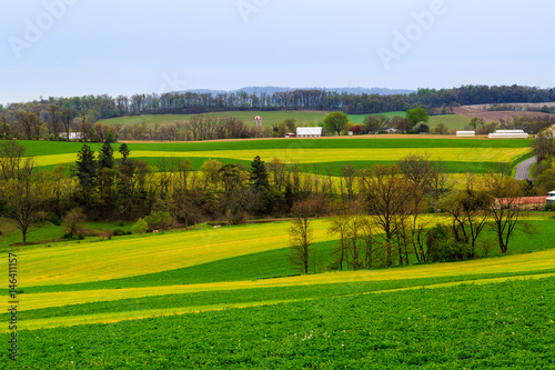 Pennsylvania countryside and farms in spring near Kutztown. Fields just starting to be plowed.