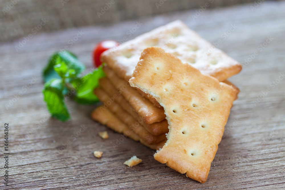 Crackers or biscuit on wooden background Crackers or biscuit on wooden background
