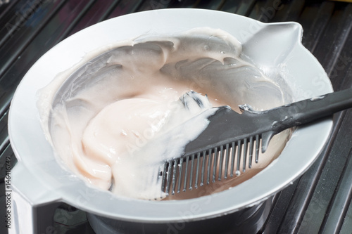 Hair coloring solution in a mixing bowl