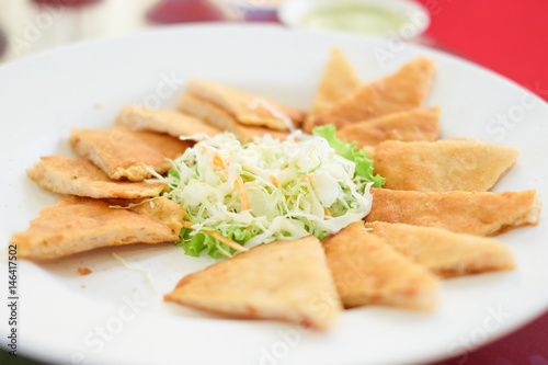 " Deep fried spring roll " serve on dish with salad vegetable , Thailand.