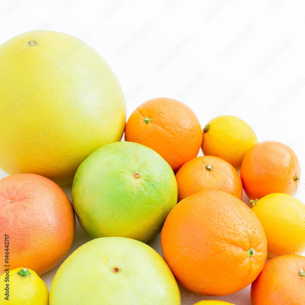 Citrus fruits on white background. Flat lay, top view. Fruit background. Citrus fruits on white background. Flat lay, top view. Fruit background.