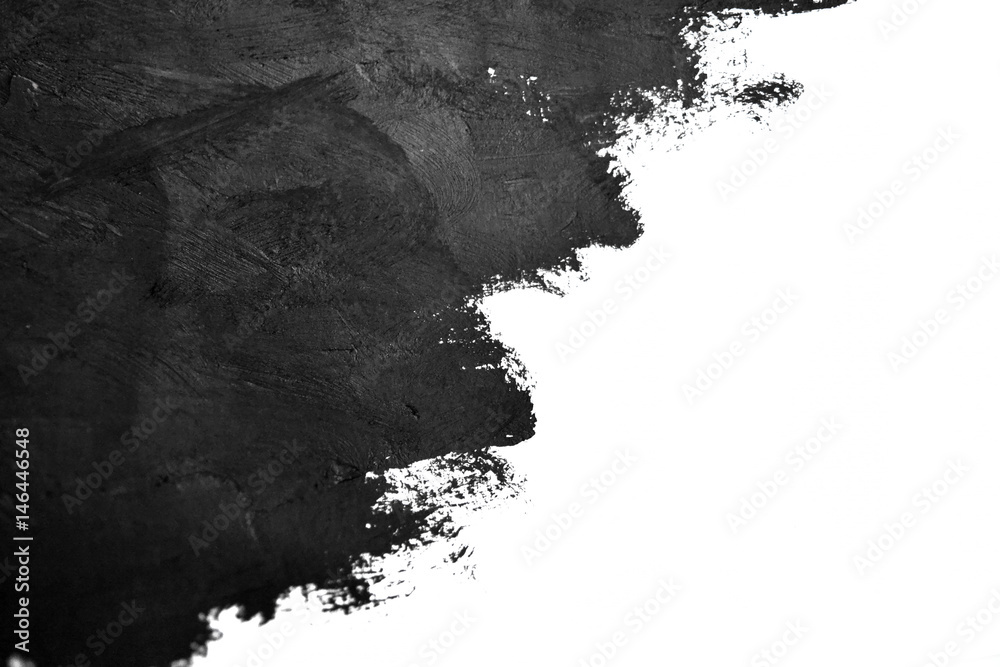 black brush strokes oil paints on white paper. Isolated on white background. Abstract creative background