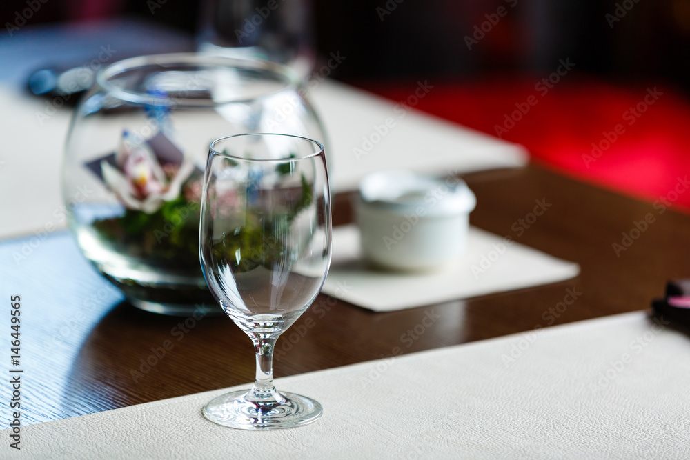 Empty glasses set in restaurant Glasses in the restaurant on the table flowers Empty glasses set in restaurant Glasses in the restaurant on the table flowers