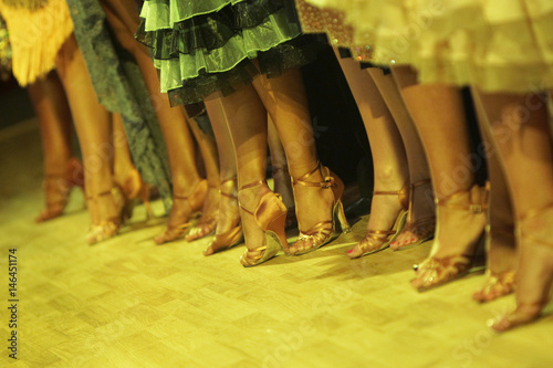 Group of latin dancers feet photo