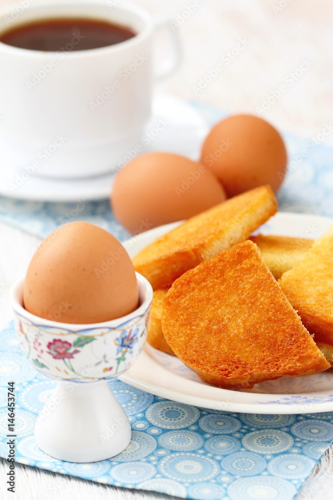 Boiled eggs and toasts for breakfast Boiled eggs and toasts for breakfast