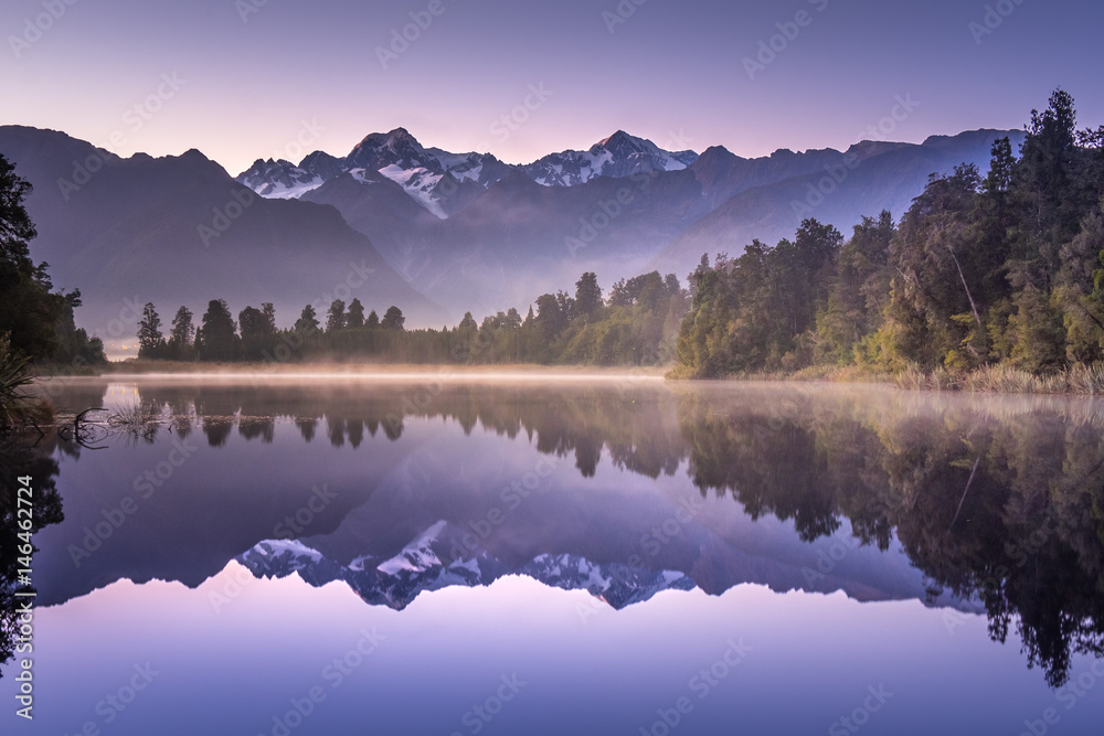 Lake Matheson. Locate near the Fox Glacier in West Coast of South Island of New Zealand.It is famous for its reflected views of Aoraki/Mount Cook and Mount Tasman.