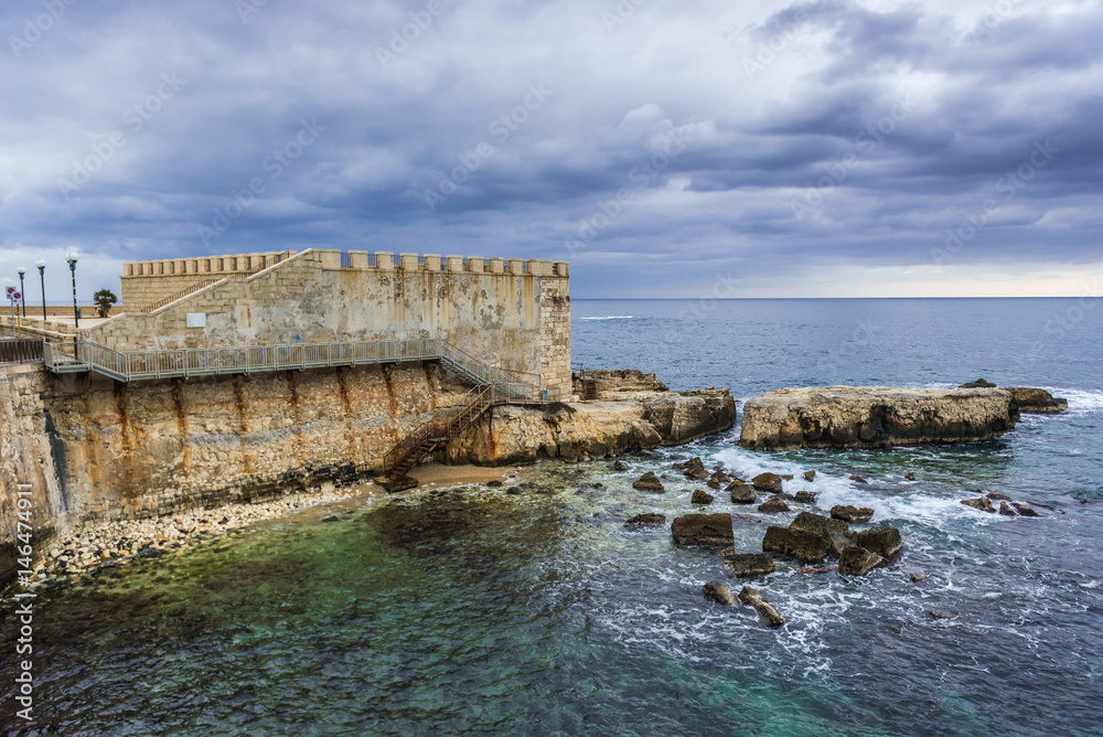 View on old walls of Ortygia isle, Syracuse city, Sicily Island in Italy View on old walls of Ortygia isle, Syracuse city, Sicily Island in Italy