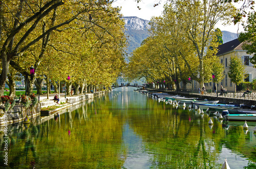 beautiful Pont des Amours (Bridge of Love) in Annecy, with reflection in water
