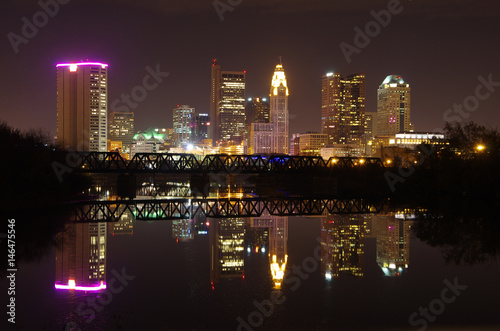 Skyline of Columbus, OH at night. Taken from across the Scioto River, with reflection in water © LKH