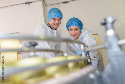 Photography Factory workers wacthing production line