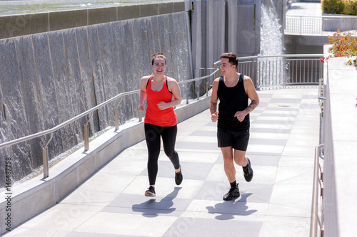 Couple running in Yerba Buena Park photo