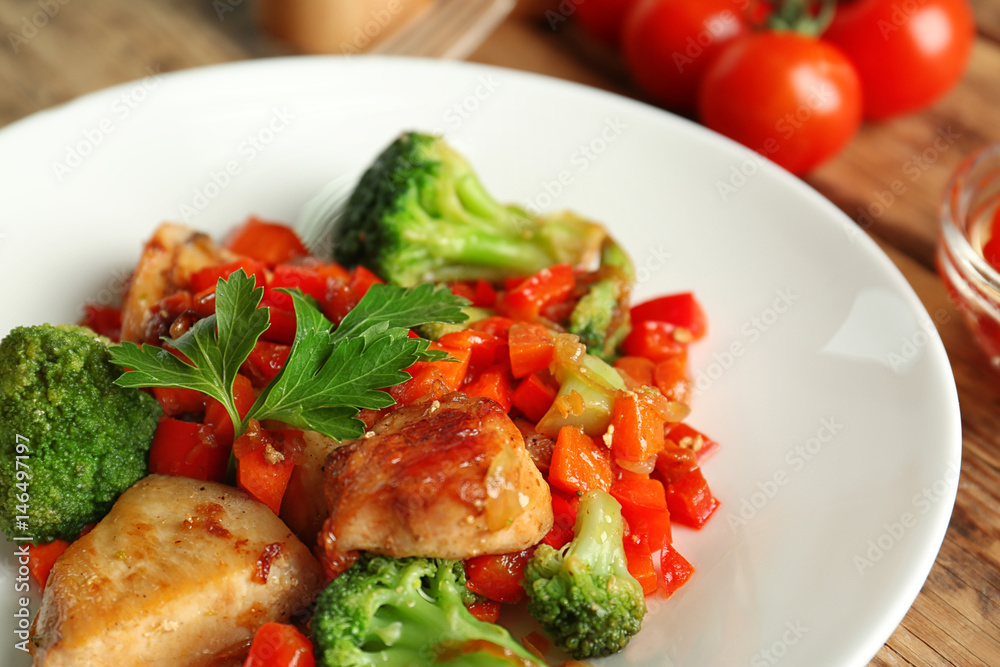 Chicken stir fry on plate, closeup Chicken stir fry on plate, closeup