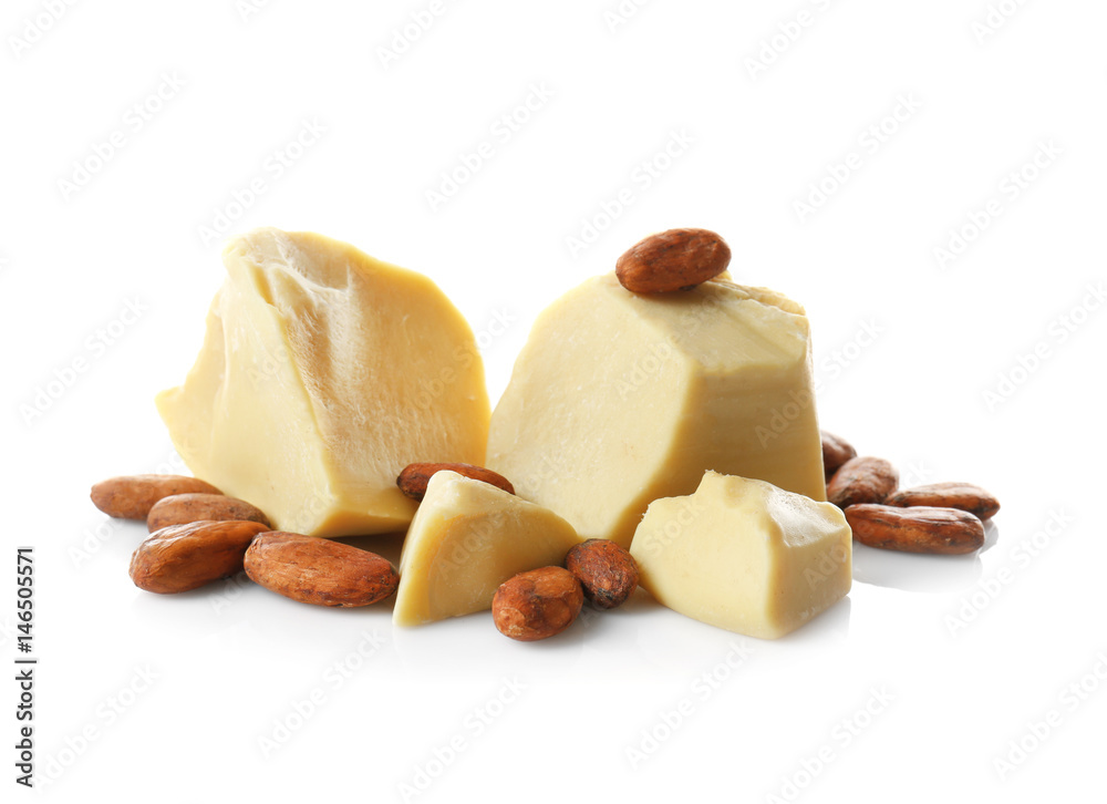 Aromatic cocoa beans and butter on white background Aromatic cocoa beans and butter on white background