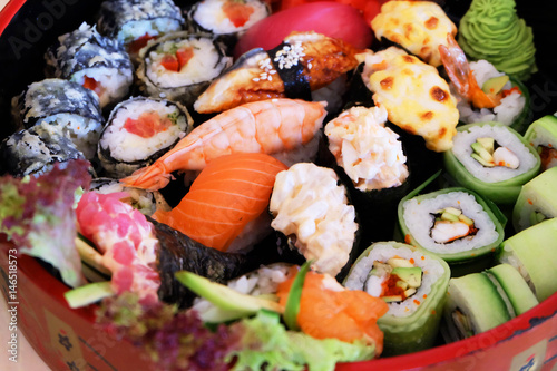 Japanese dishes: sushi, rolls, sashimi.