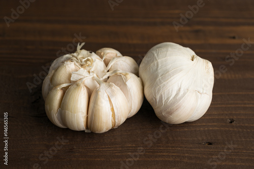 garlics close up on table wood vintage background