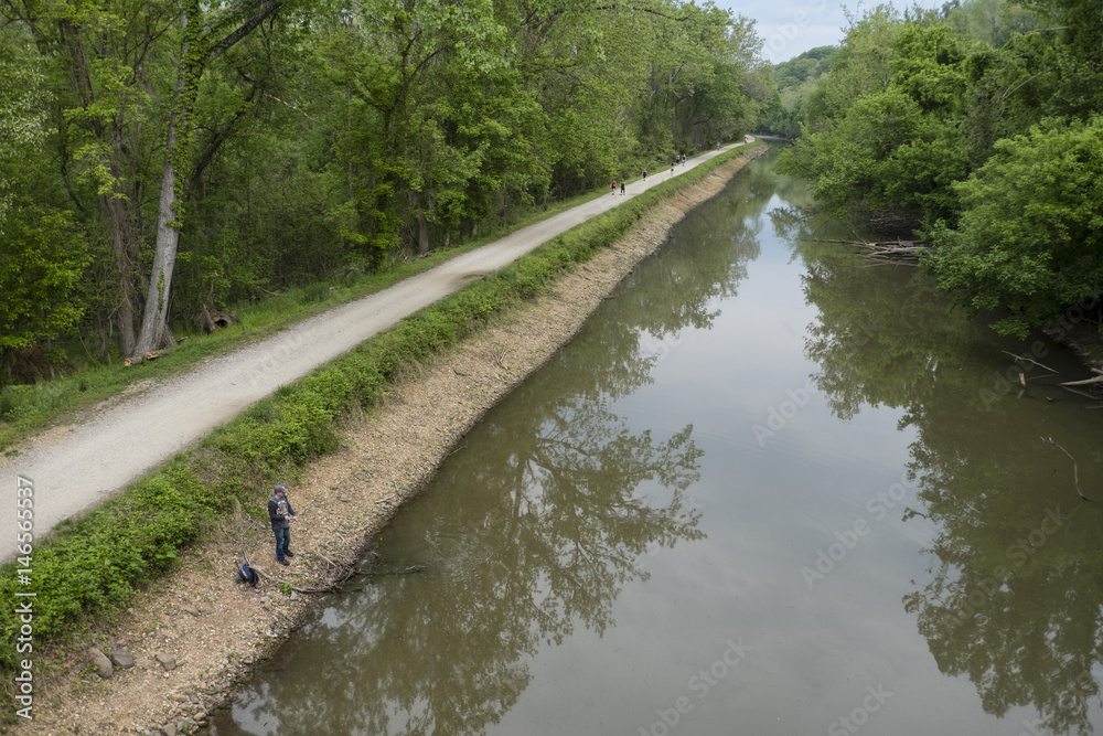 Washington DC C&O Canal with fisherman Washington DC C&O Canal with fisherman