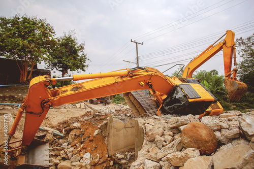 The backhoe is overturning at the construction site, Top Photos
