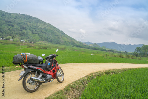 Motorbike between rice fields