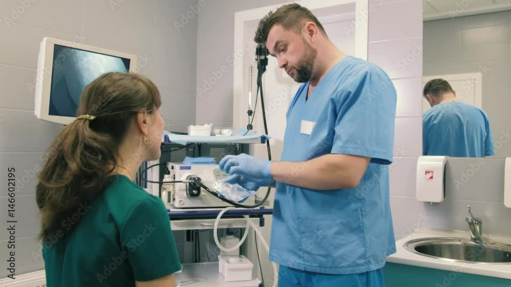 Doctor makes a gastroscopy young girl through the mouth 4k Doctor makes a gastroscopy young girl through the mouth 4k