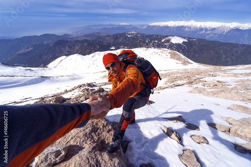 Photography Winter hiking in the mountains with a backpack.