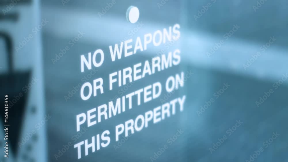 No weapons or firearms or guns allowed in corporate building sign